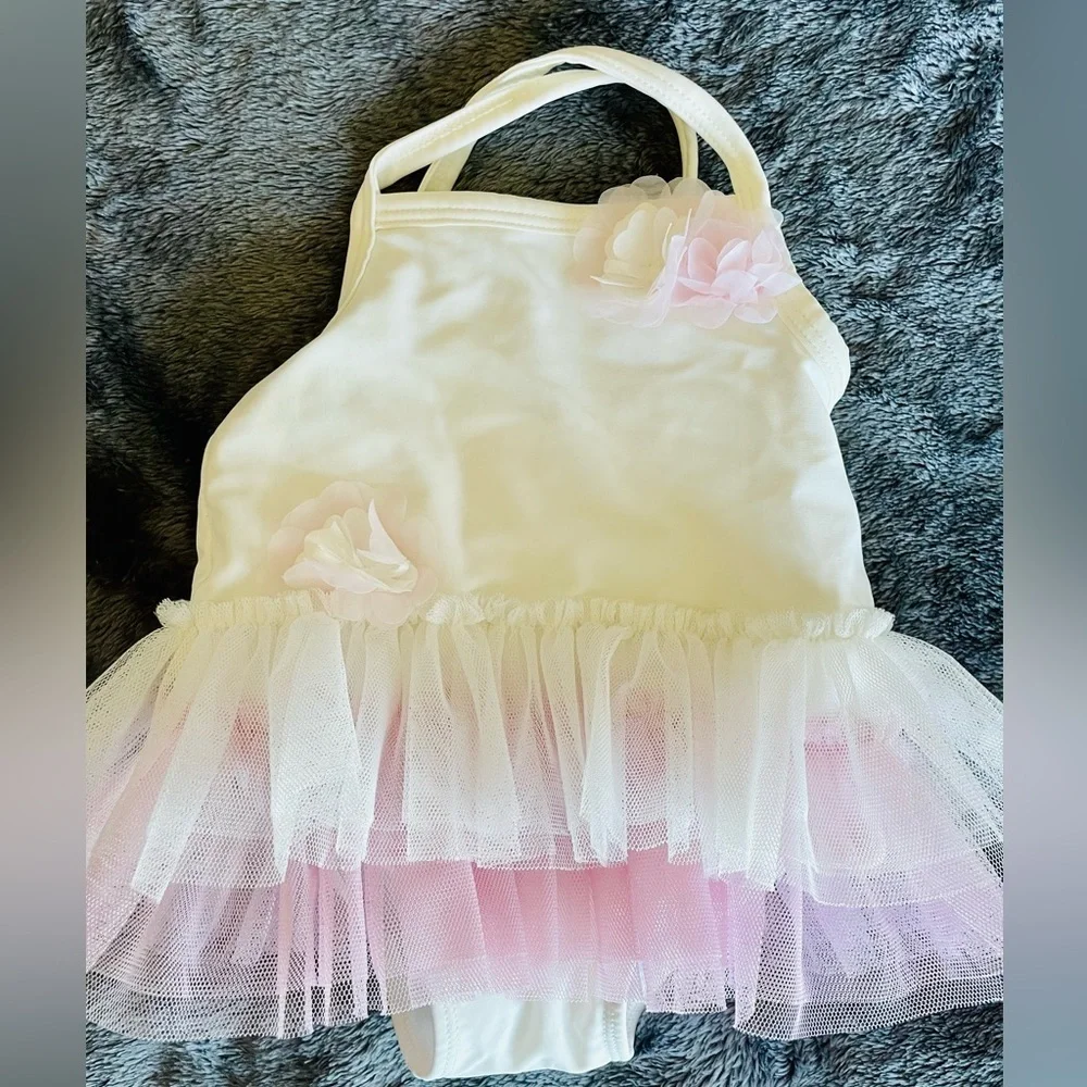 Adorable swimsuit size 3-6M with ruffles